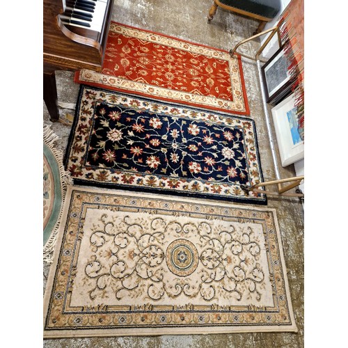 623 - Three assorted floor rugs