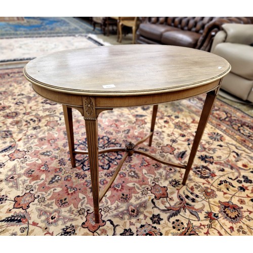 625 - Sun bleached oval occasional table 