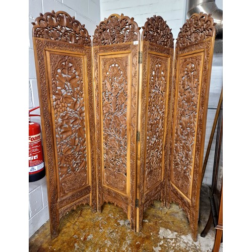 597 - Carved folding room divider, 177cm high