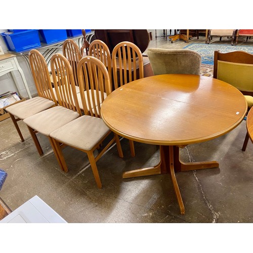 664 - Circular dining table & 6 chairs