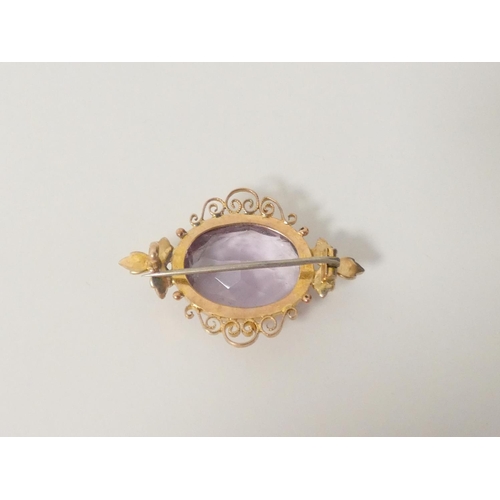 111 - Pearl and amethyst brooch in gold, probably 15ct