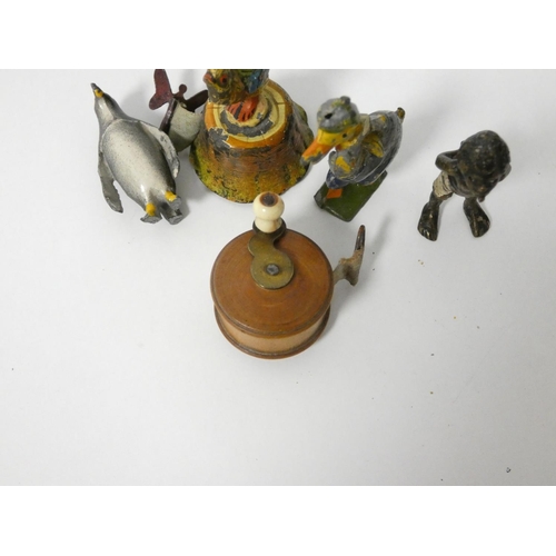 117 - Two tape measures and three cold painted small figures.