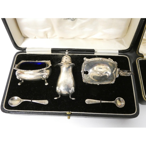 118 - Silver three piece condiment set and a napkin ring, both cased.