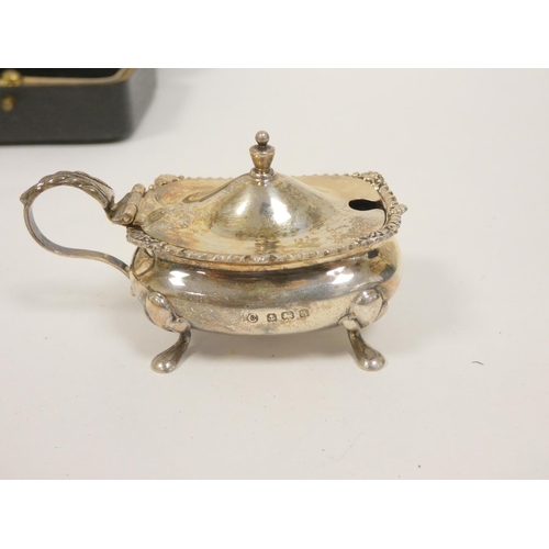 118 - Silver three piece condiment set and a napkin ring, both cased.