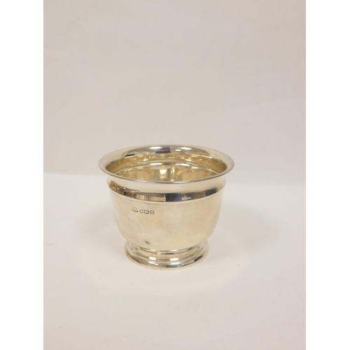 121 - Silver plain bowl, three napkin rings (115g), also six mounted toilet items.