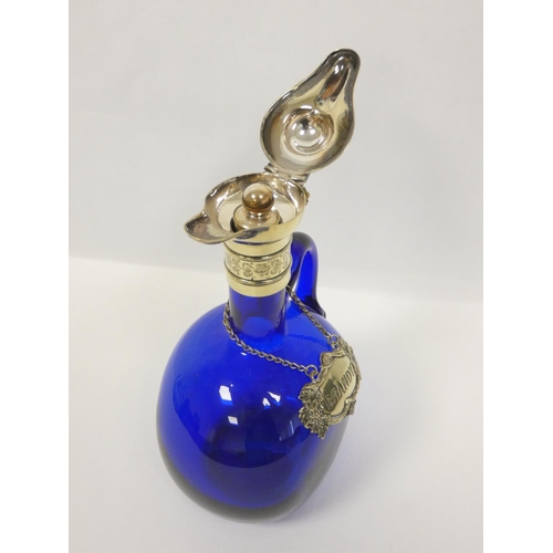 122 - Blue glass ewer of ovoid shape, e.p. mounts and label C1890