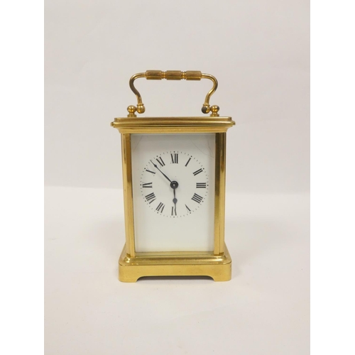 142 - Early 20th century carriage timepiece with glass sides and cylinder escapement.