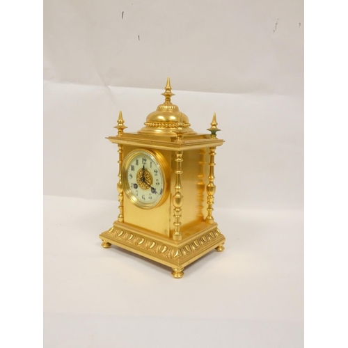 143 - French gilt mantel clock in architectural style case with campana shaped top, columns and spike fini... 