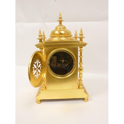 143 - French gilt mantel clock in architectural style case with campana shaped top, columns and spike fini... 