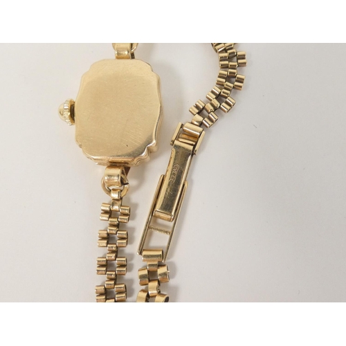 75 - Lady's Avia 9ct gold bracelet watch 1979, 10g, without movement