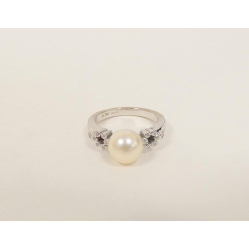 81 - Pearl ring with diamond set shoulders in 18ct white gold. Size 'M' 5g gross