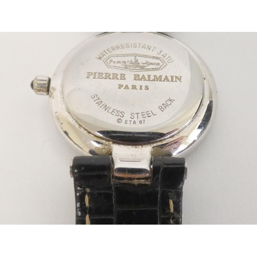 85 - Lady's Pierre Balmain watch, stainless on strap.