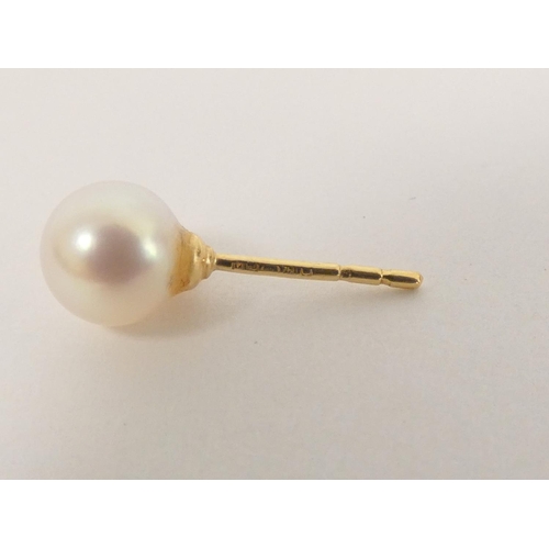 86 - Pair of Mikimoto cultured pearl and diamond ear studs in 18ct gold.