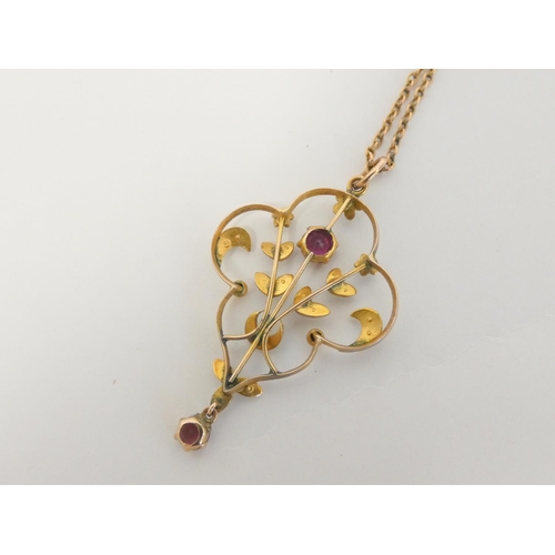 88 - Garnet pendant on necklet '9ct', another, two gold pins and a pair of ear studs. 11g gross.