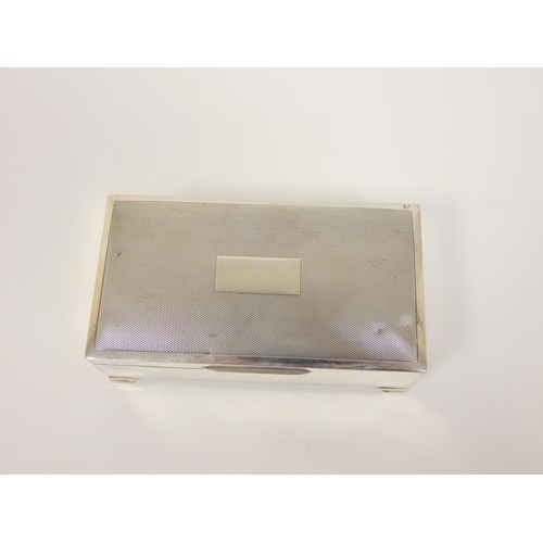 98 - Silver cigarette case, engine turned, 16cm.