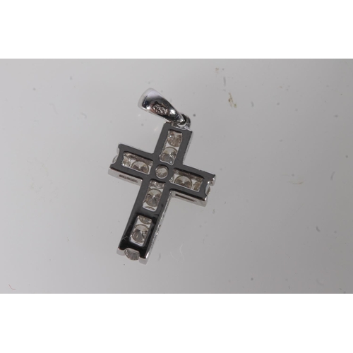 587 - 18ct white gold diamond cross pendant on 18ct white gold chain, 3.8g gross held in Hamilton and Inch... 