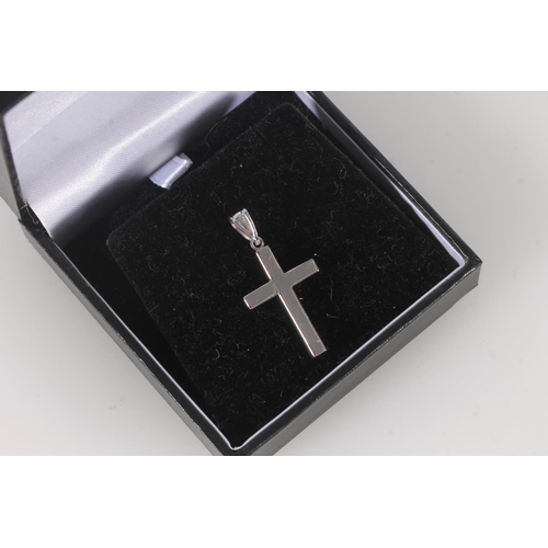 588 - 9ct white gold cross pendant 1g.