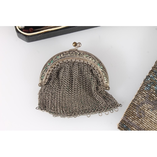 593 - Mid 20th century bead work evening bag with gilt metal cantle, a chain mail chatelaine purse and a b... 