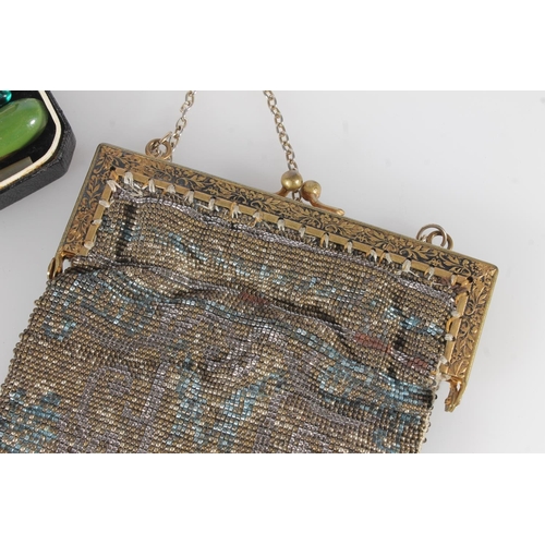 593 - Mid 20th century bead work evening bag with gilt metal cantle, a chain mail chatelaine purse and a b... 