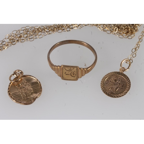 601 - 9ct gold signet ring, a 9ct gold neckchain and two unmarked St Christopher pendants, 1.9g gross.