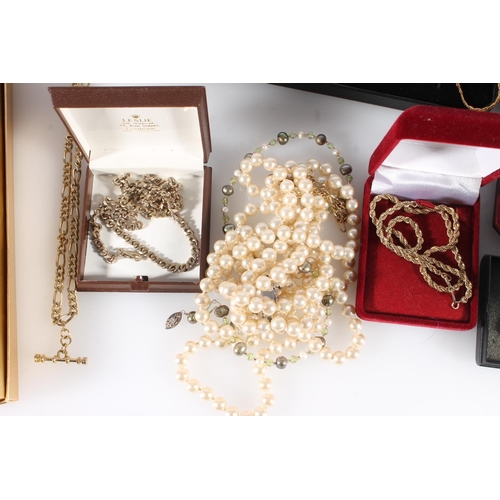 615 - Costume jewellery to include plated chains and necklaces, a baroque pearl necklace, faux pearls, an ... 