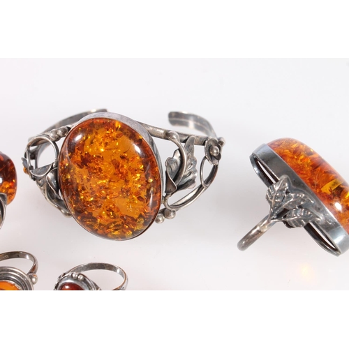 631 - Group of amber set silver and other dress rings.