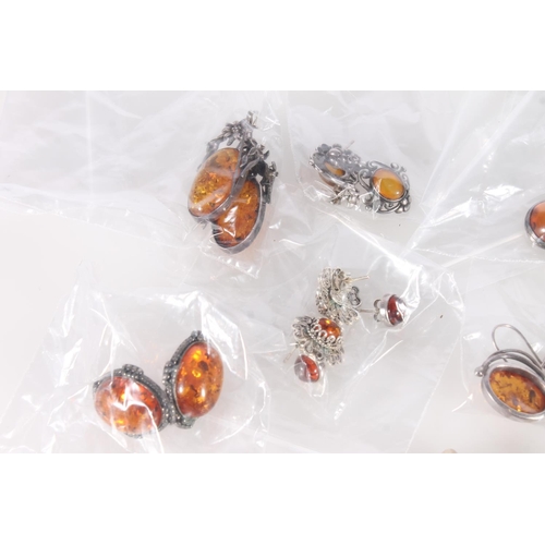 632 - Group of amber set silver and other earrings.