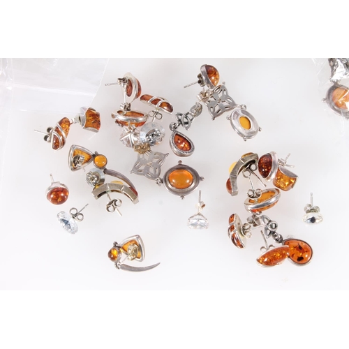 632 - Group of amber set silver and other earrings.