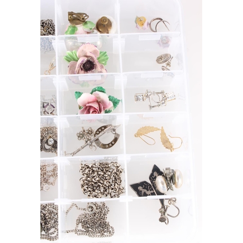 653 - Case containing costume jewellery to include silver necklaces, Siamese earrings and others, floral e... 