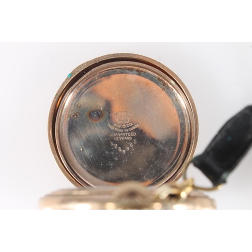 657 - Gold plated half hunter keyless pocket watch with 15 jewel Swiss movement.