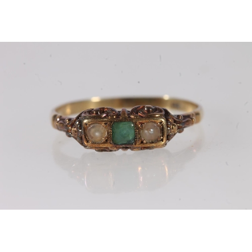 663 - 14ct gold emerald and pearl three stone ring, size P, 1.6g.