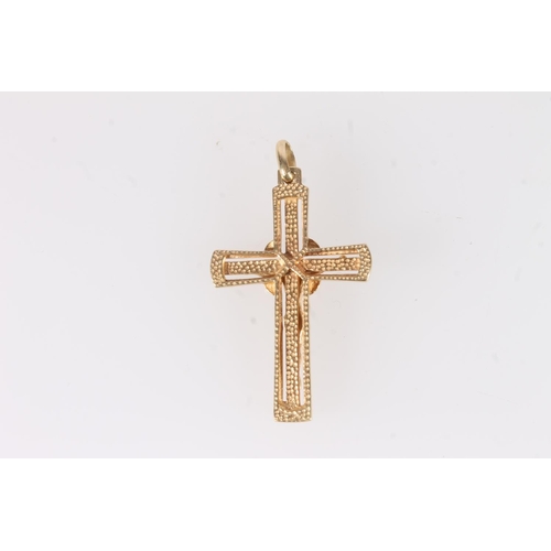 670 - Italian 18ct gold crucifix pendant, 3.0g.