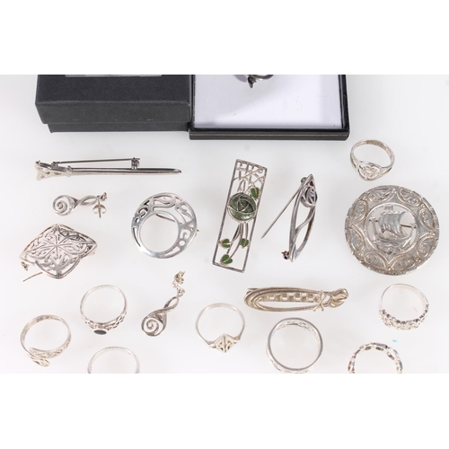 696 - Scottish and Celtic inspired silver and white metal jewellery to include a Glasgow silver longship b... 