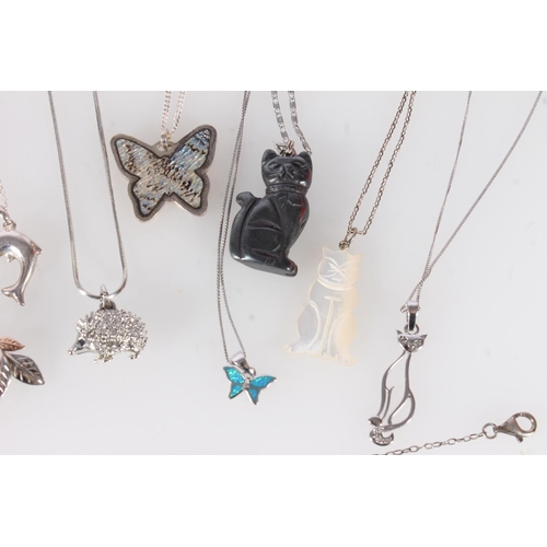 715 - Twelve flora and fauna themed pendant necklaces, some silver.