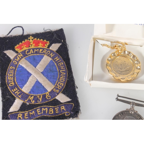 731 - WWI war medal of Private Cumming of the Cameron Highlanders [S-22169 PTE J CUMMING CAMERONS], an Ach... 