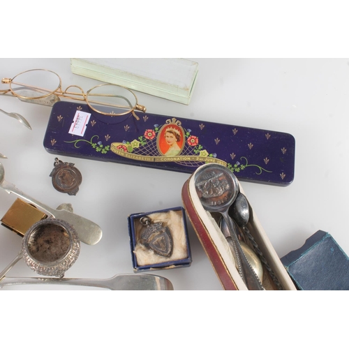 741 - Curios to include two silver medal fobs, a Moroccan coin spoon, two pair of vintage glasses, cased s... 