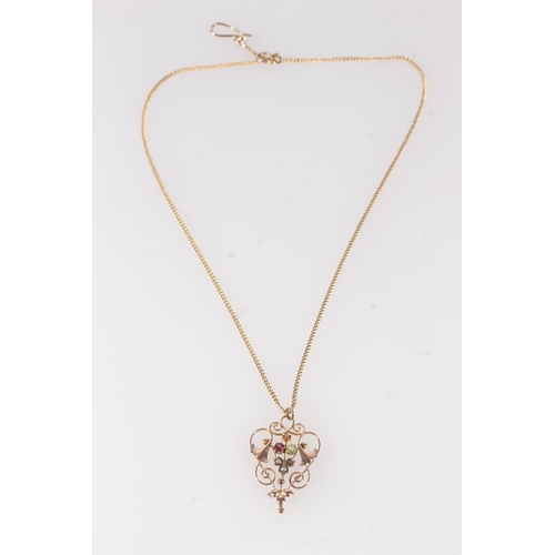 753 - Edwardian 9ct gold openwork pendant in the Art Nouveau style set with seed pearl, peridot and ruby, ... 