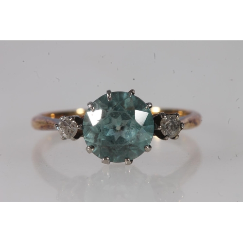 756 - 18ct gold diamond and aquamarine blue stone dress ring, 2.6g, held in Whibley and Son of Worthing je... 