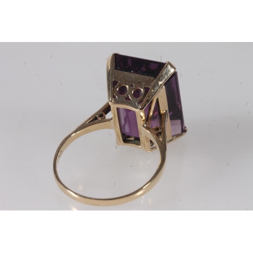 757 - 9ct gold amethyst dress ring, 5.8g and a pair of similar earrings 4.2g, 10g gross. (2)