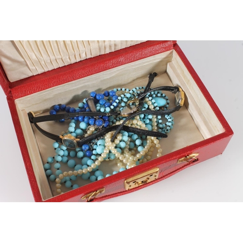 764 - Red leather covered jewellery box containing costume jewellery to include Lapis Lazuli blue bead nec... 