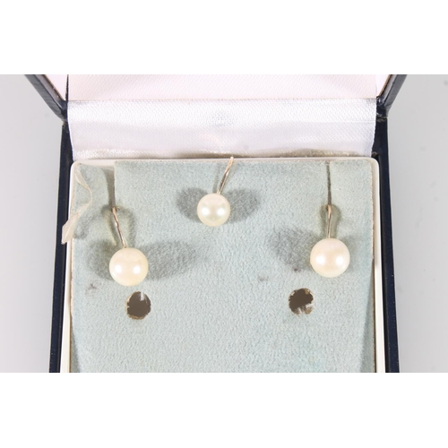 765 - Three 9ct gold mounted pearl earrings held in Mikimoto box.