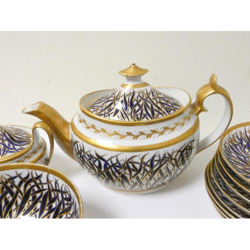 213 - New Hall, pattern 741, porcelain teaset with blue and gilt entwined foliage borders, comprising a te... 