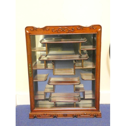 401 - 20th century Chinese rosewood wall display cabinet, the glazed door enclosing stepped shelves. Heigh... 