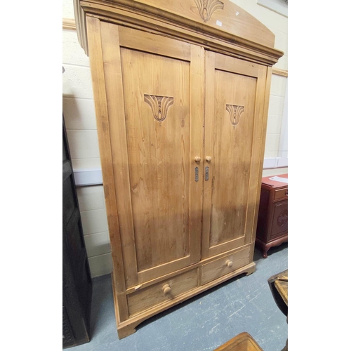 439 - Art Deco continental pine two drawer wardrobe having two small drawers and carved Egyptian lotus flo... 