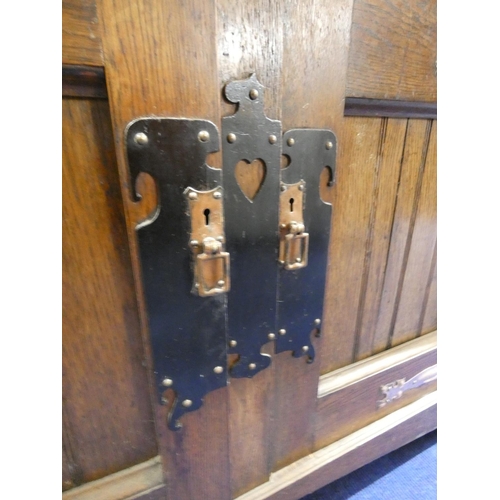 448 - Arts and crafts oak mirrored back sideboard in the manner of Shapland and Petter with shelved overti... 