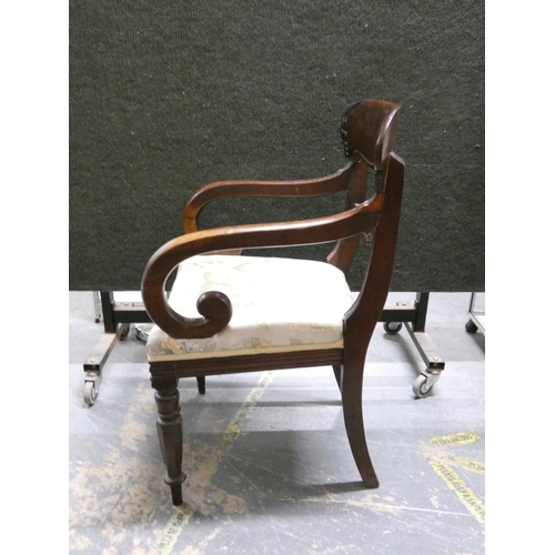 449 - Regency carved mahogany carver chair with stuff over seat raised on turned  supports  Height 90cm.