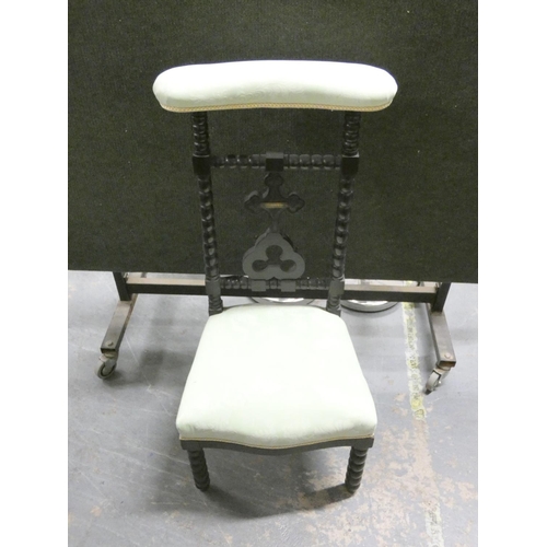 450 - Victorian ebonized oak gothic revival prie dieu with bobbin turned backrest, united by a central cro... 