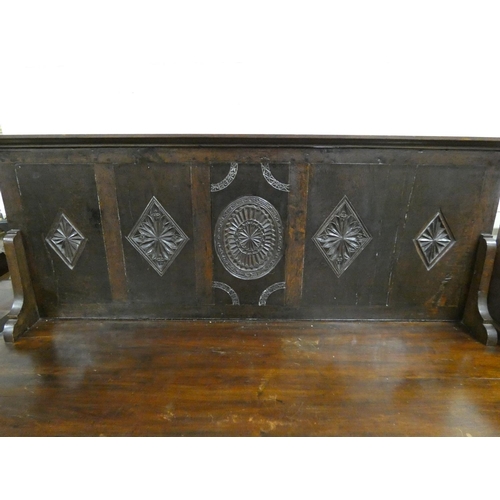 456 - Antique oak sideboard being a marriage of earlier examples having a backplate with incised mandala p... 