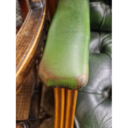 641 - Chesterfield-style green leather swivel chair 