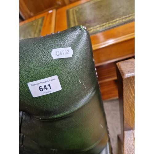 641 - Chesterfield-style green leather swivel chair 